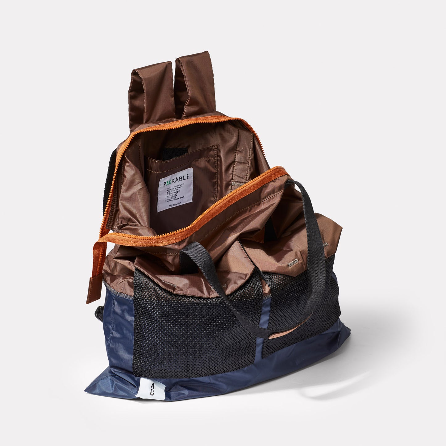 Hank Brown Navy Rucksack in Mocha from British Backpack Brands Ally Capellino