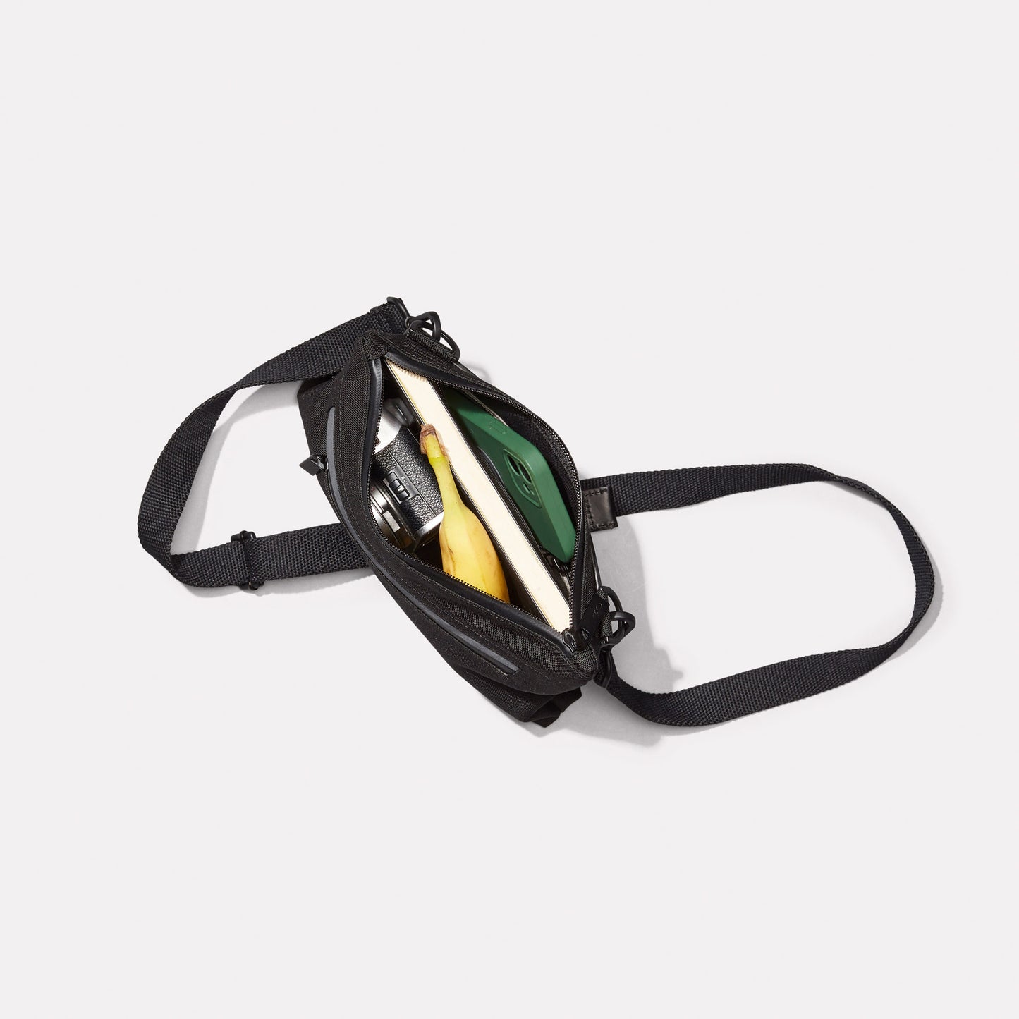 Herb Travel Cycle Crossbody Bag in Black