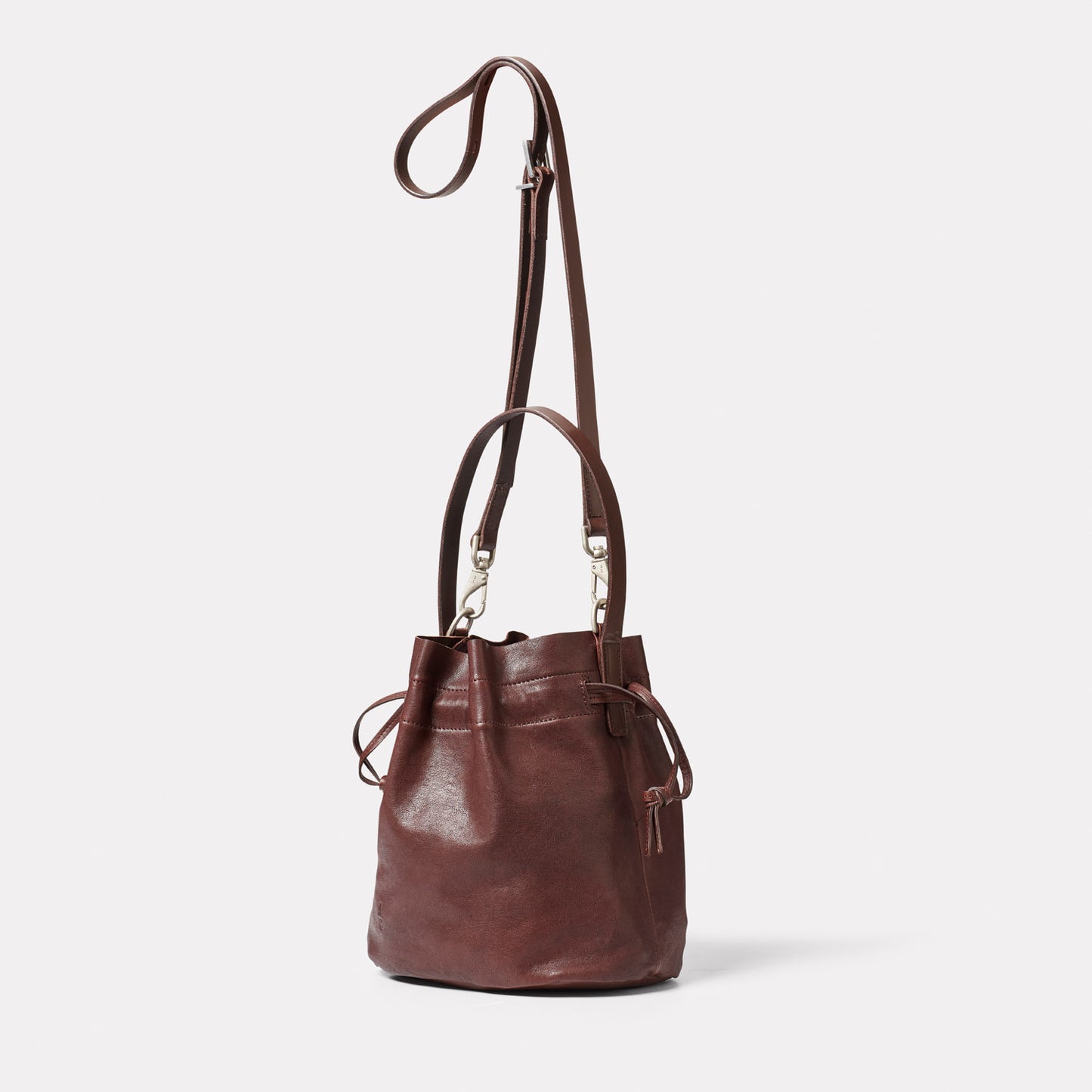 Dora Small Leather Crossbody Bucket Bag in Dark Brown