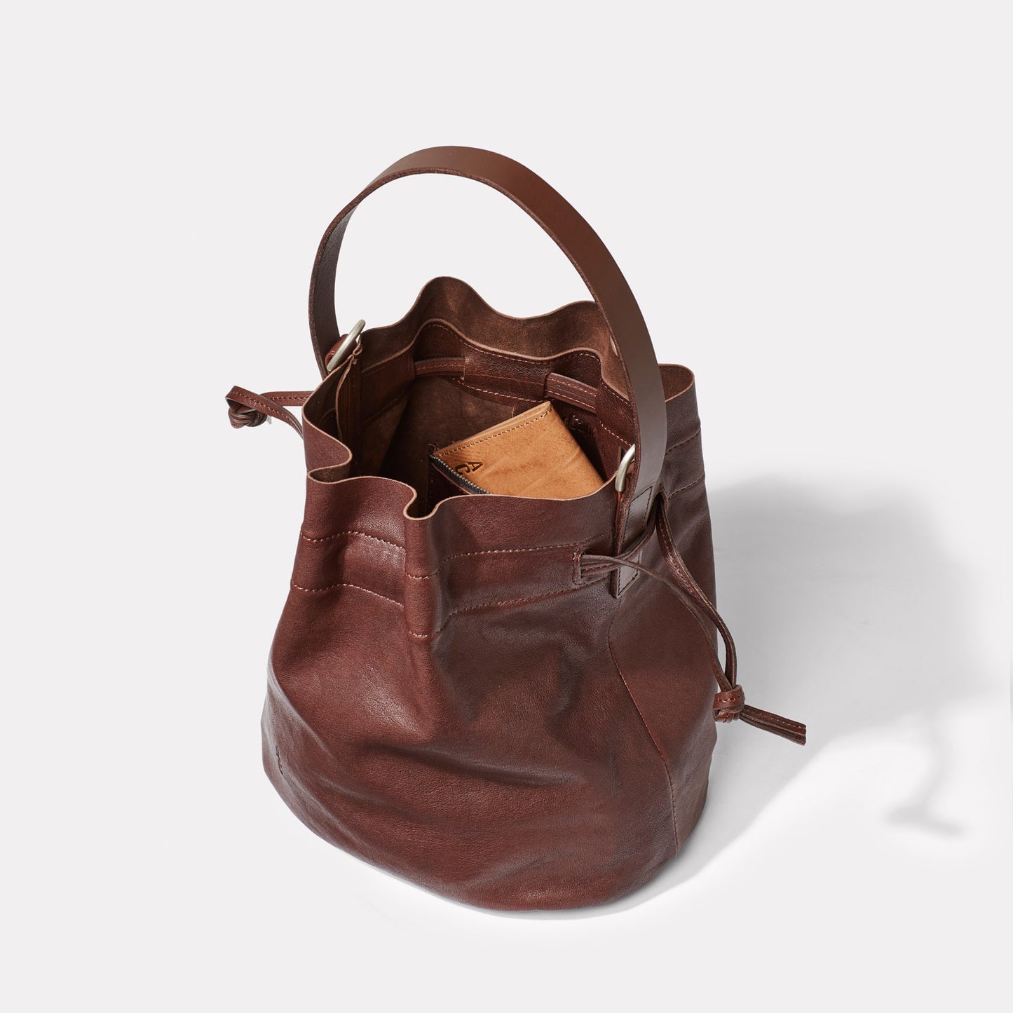 Dora Small Leather Crossbody Bucket Bag in Dark Brown