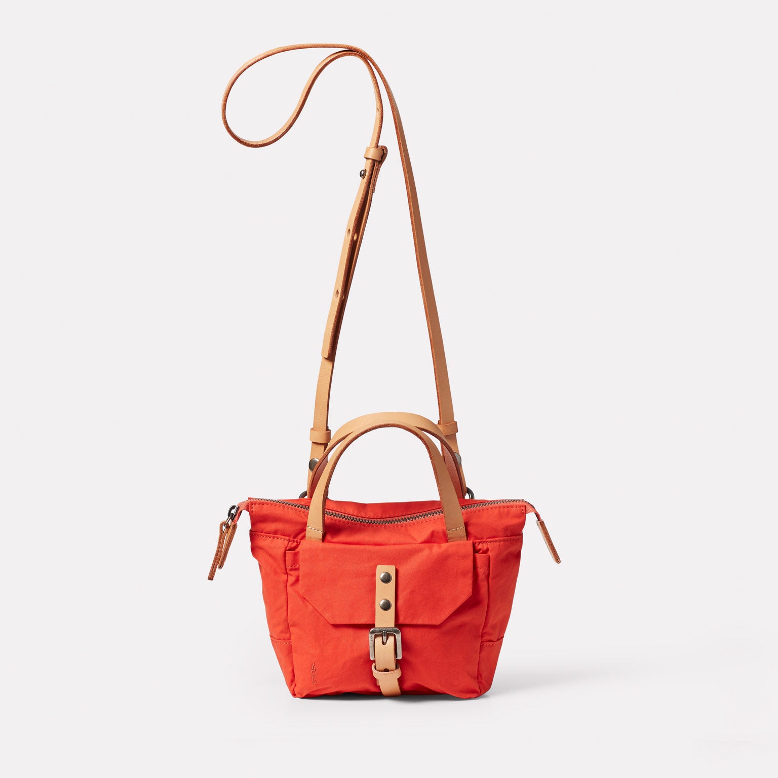 Squat 2.0 Waxed Cotton Mini Crossbody Bag in Lava