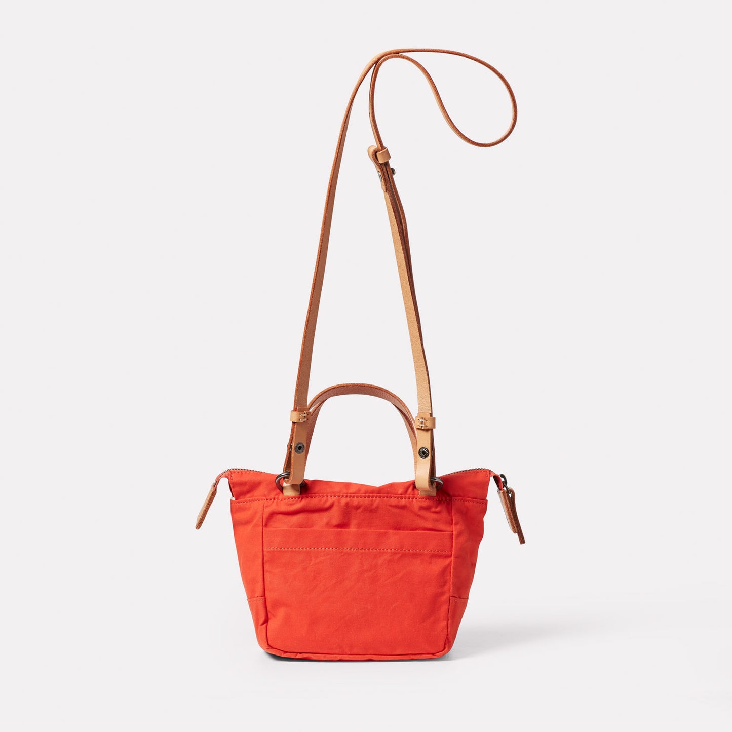 Squat 2.0 Waxed Cotton Mini Crossbody Bag in Lava