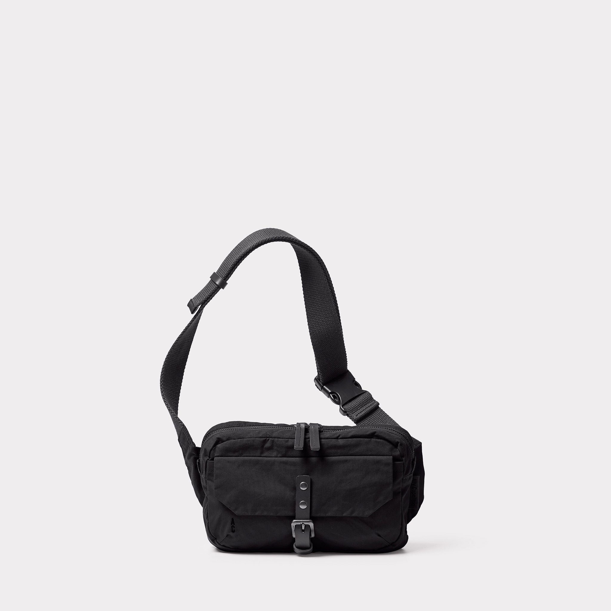 Fela Waxed Cotton Bumbag in Black