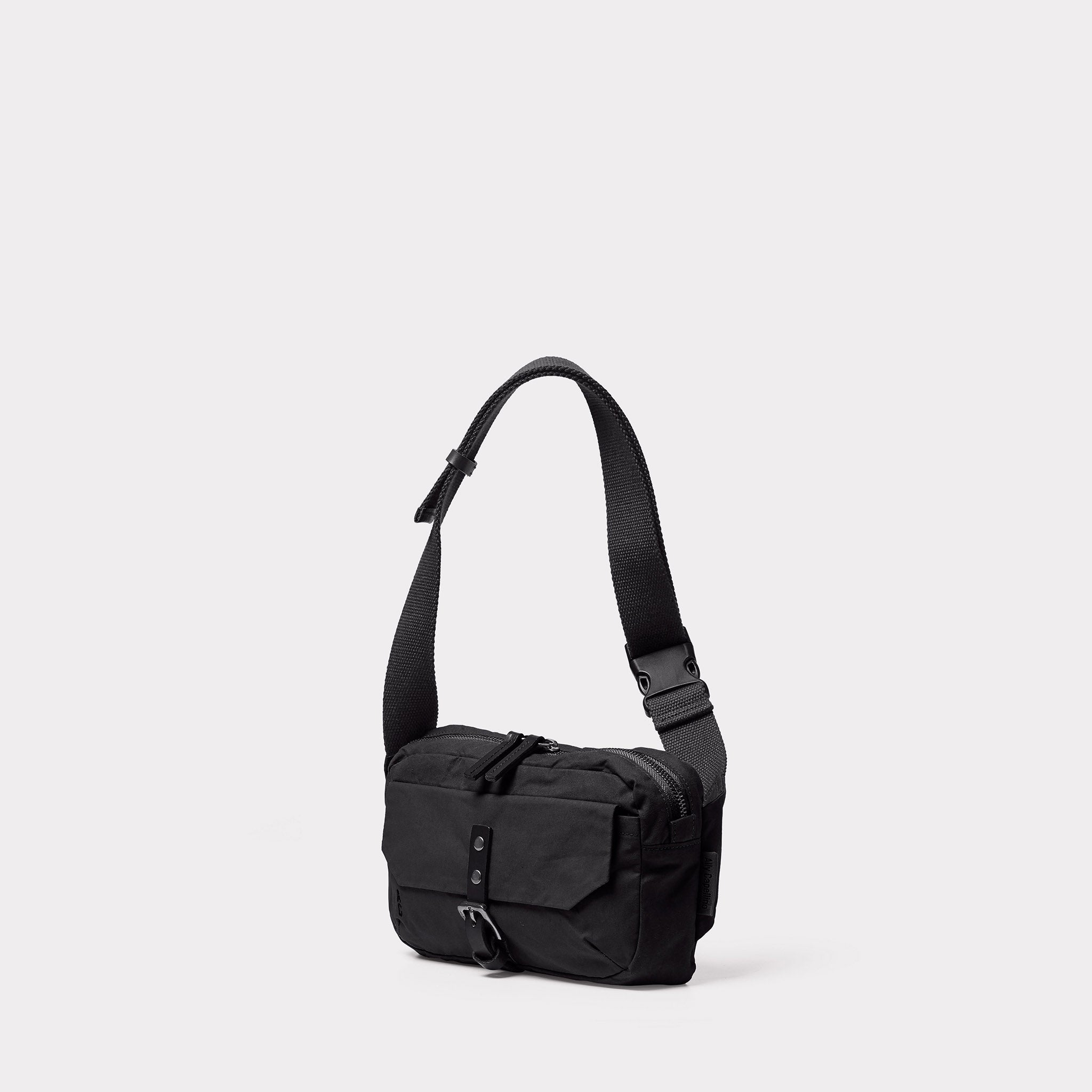 Fela Waxed Cotton Bumbag in Black
