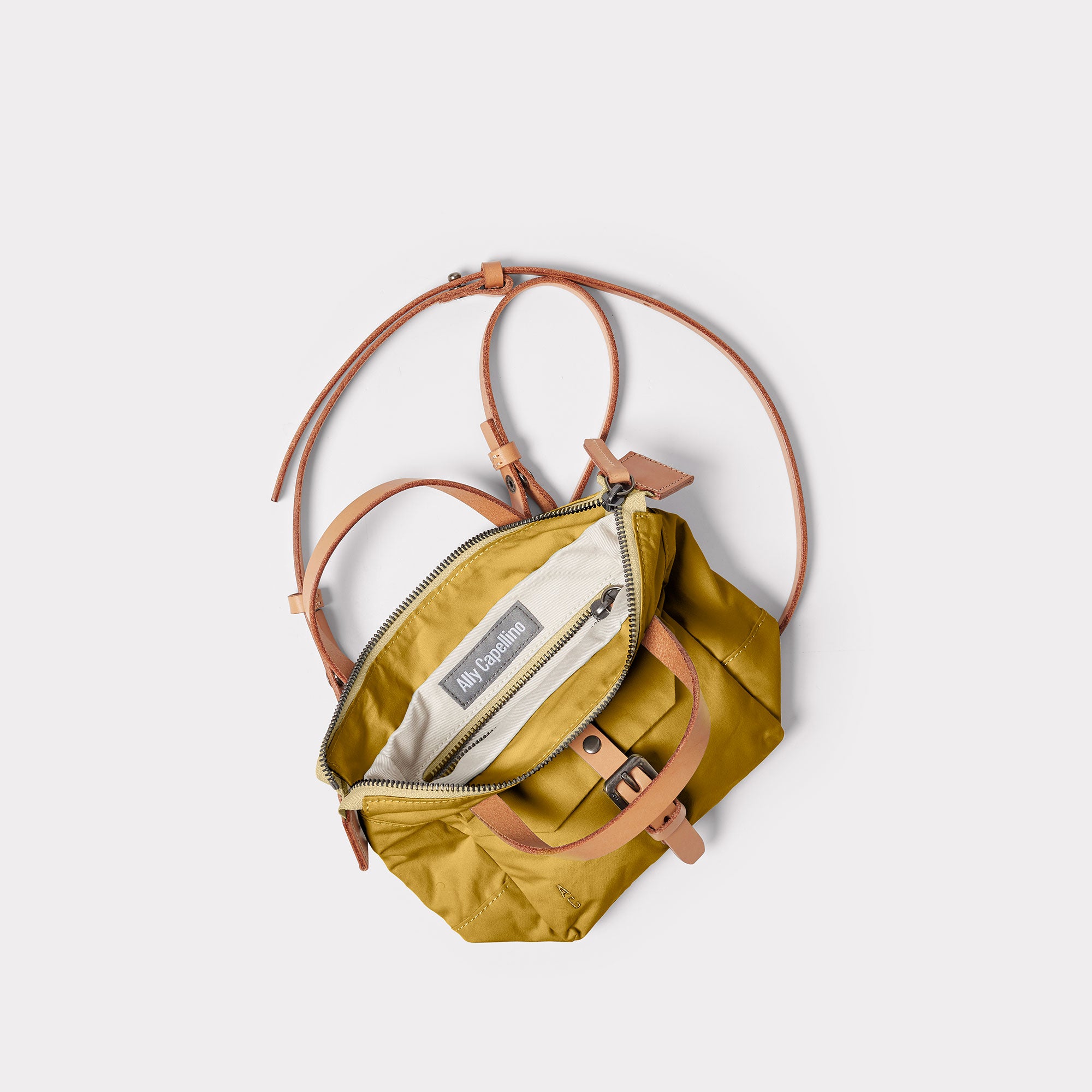 Squat 2.0 Waxed Cotton Mini Crossbody Bag in Sulfur
