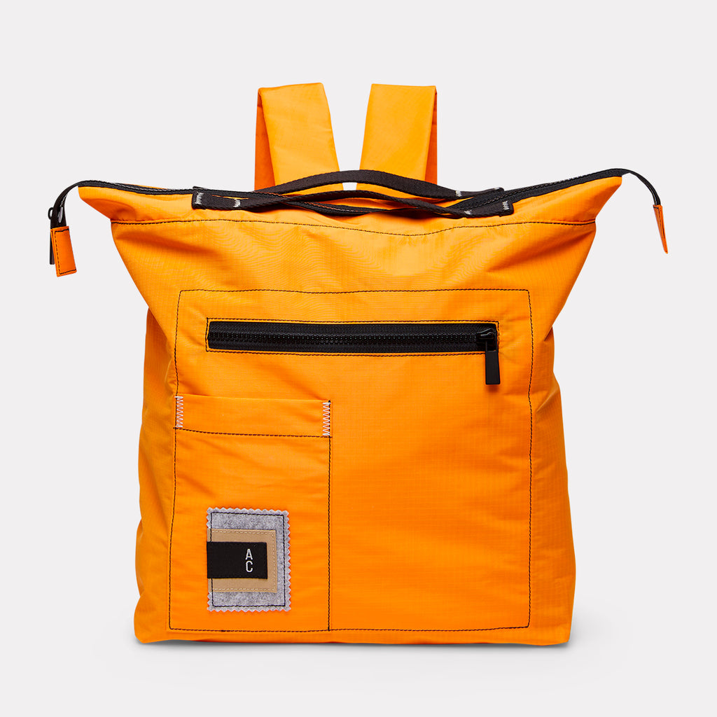Rupert recycled ripstop backpack in tangerine