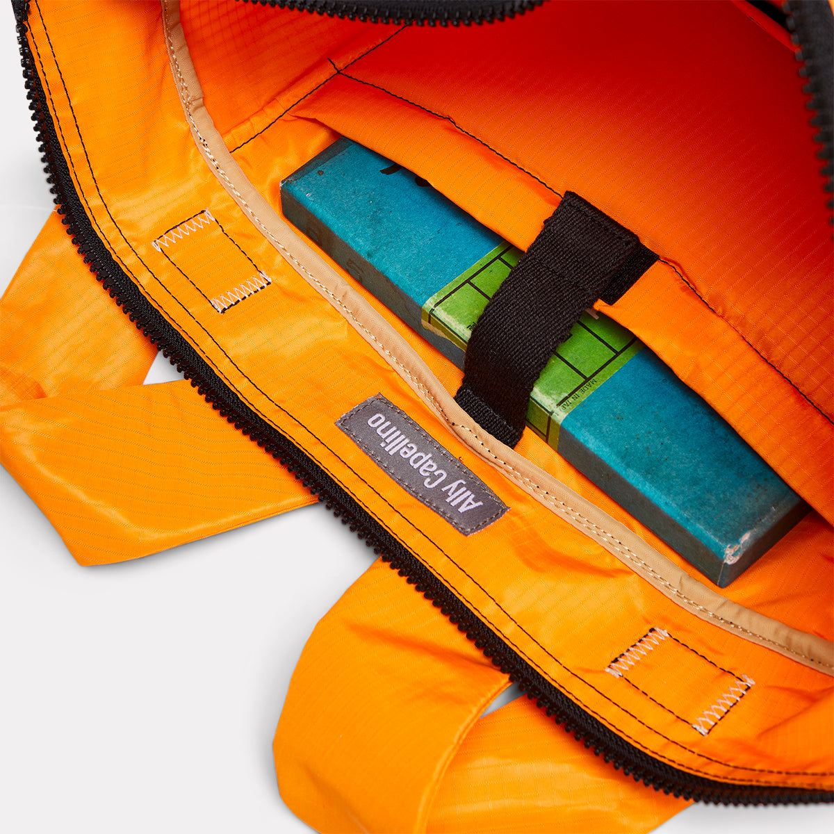 Rupert recycled ripstop backpack in tangerine