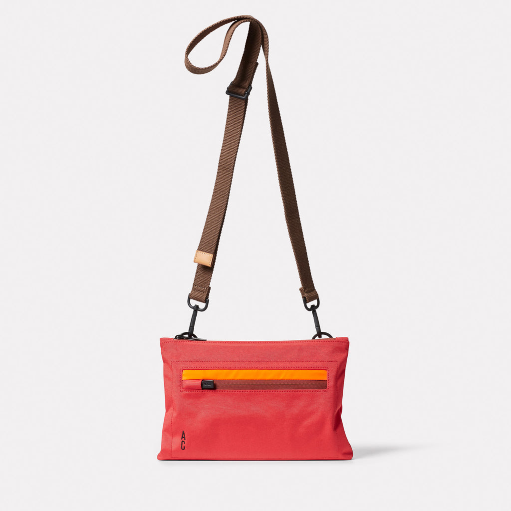 Herb Travel Cycle Recycled Crossbody Bag in Crimson