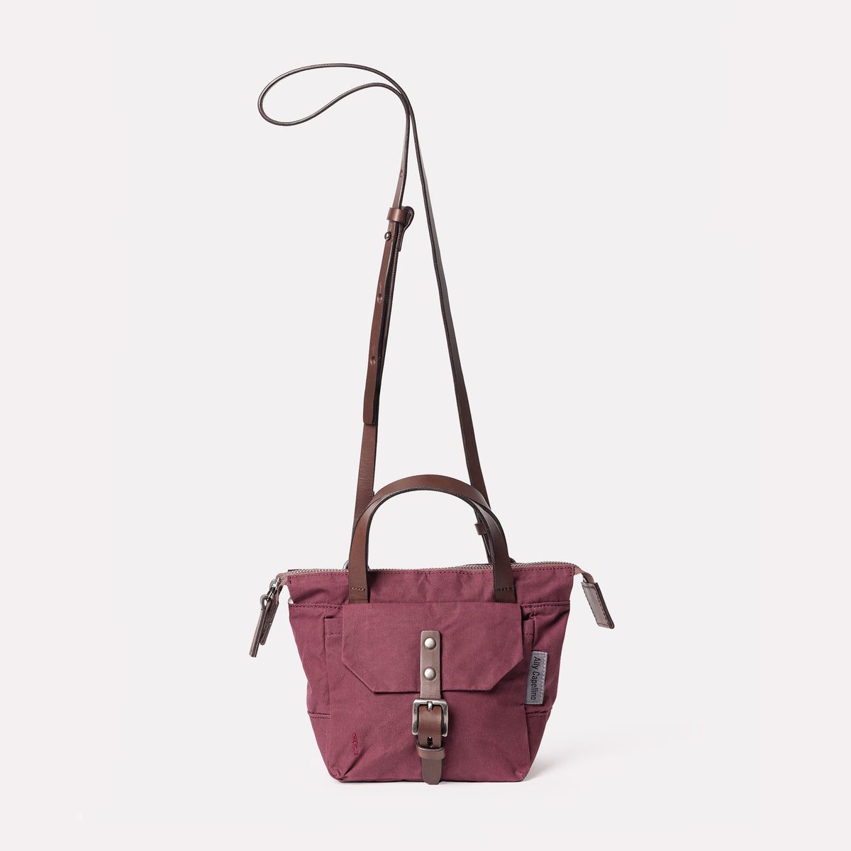 Squat 2.0 Waxed Cotton Mini Crossbody Bag in Grape