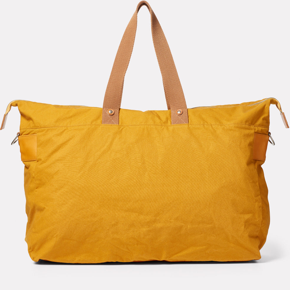 Freddie Waxed Cotton Holdall in Cumin
