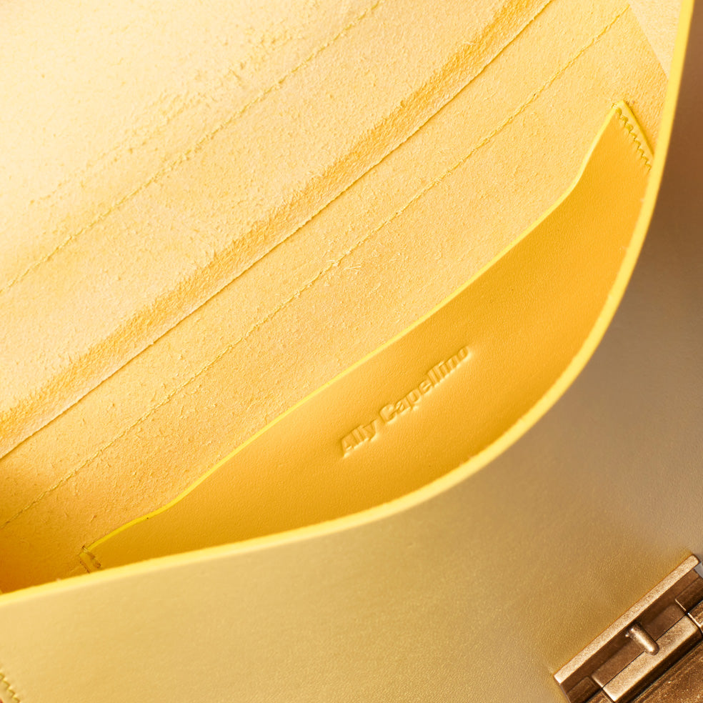 Lori Boundary Leather Crossbody Lock Bag in Yellow
