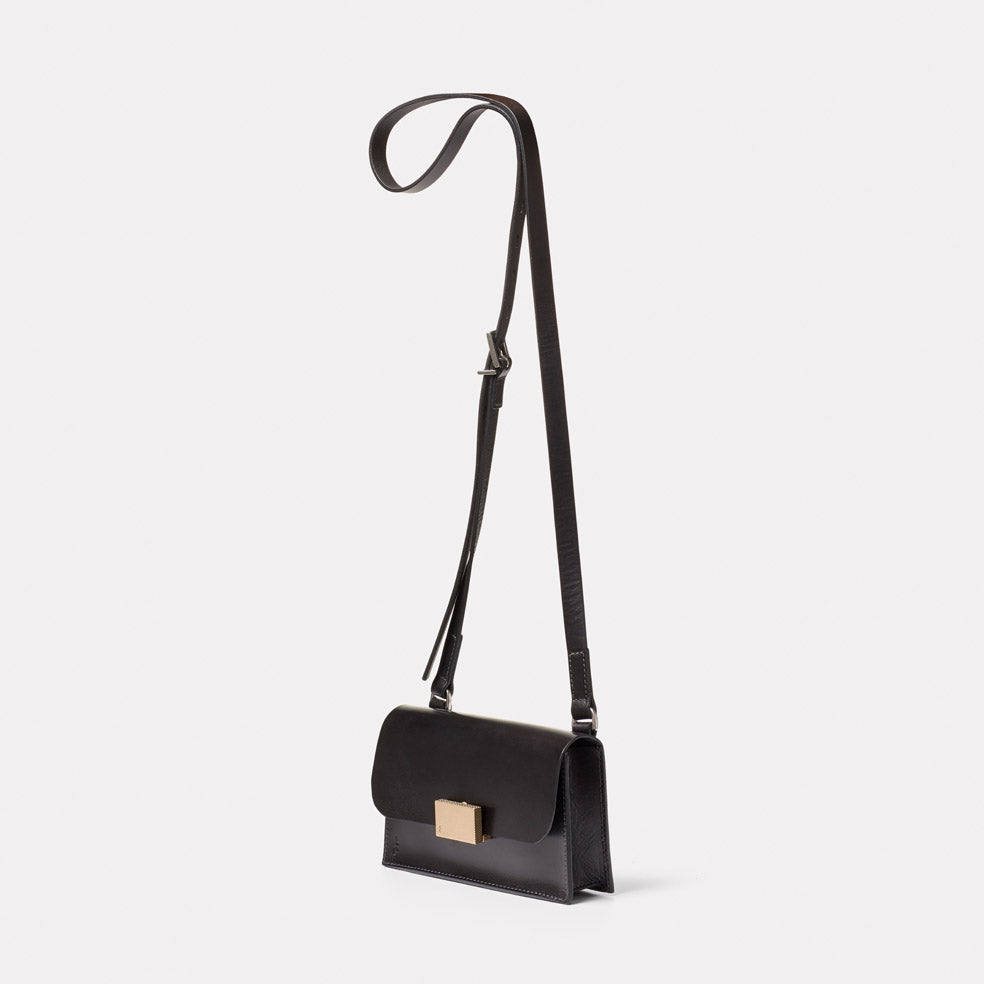 Mini Lock Boundary Leather Crossbody Lock Bag in Black