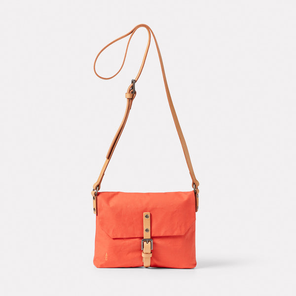 Waste You Want Friday Waxed Cotton Crossbody Bag in Red Orange