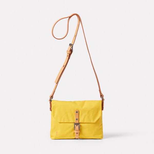 Waste You Want Friday Waxed Cotton Crossbody Bag in Yellow