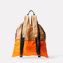 Hank Packable Zip Top Tote Backpack in Orange front back view