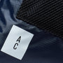 Hank Packable Zip Top Tote/Backpack in Navy and Grey logo detail