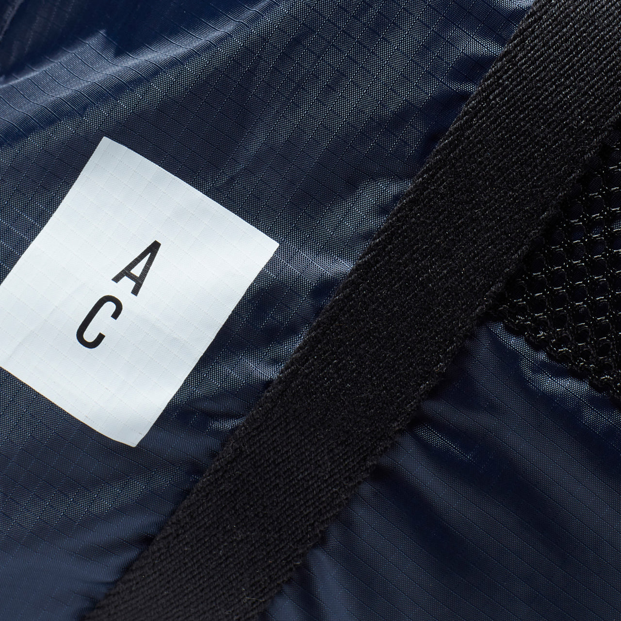 Harvey Packable Drawstring Tote/Backpack in Navy and Grey