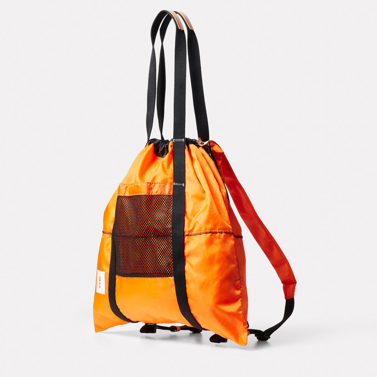 Harvey Packable Drawstring Tote/Backpack in Orange