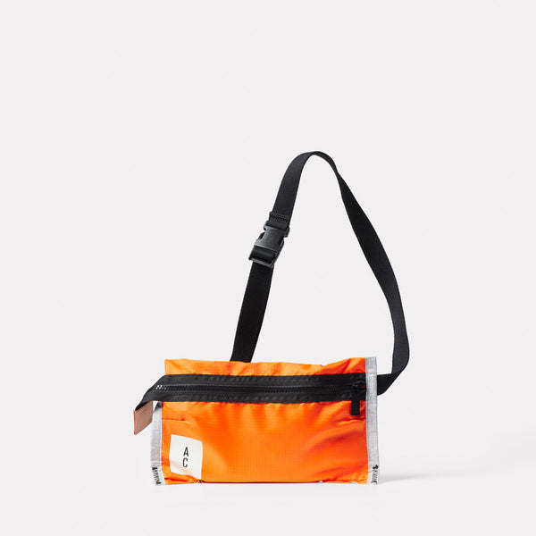 Herbert Packable Zip Top Belt Bag in Orange front