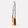 Herve Packable Pouch in Orange side view