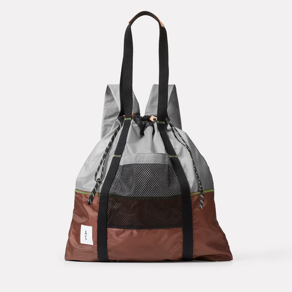 Harvey Packable Drawstring Tote Backpack in Brown front