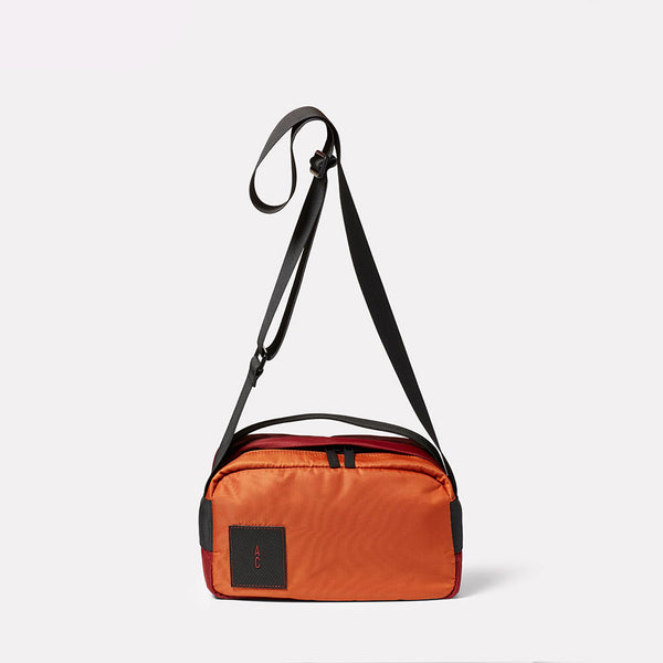 Leila B Nylon Crossbody Bag in Rust | Ally Capellino