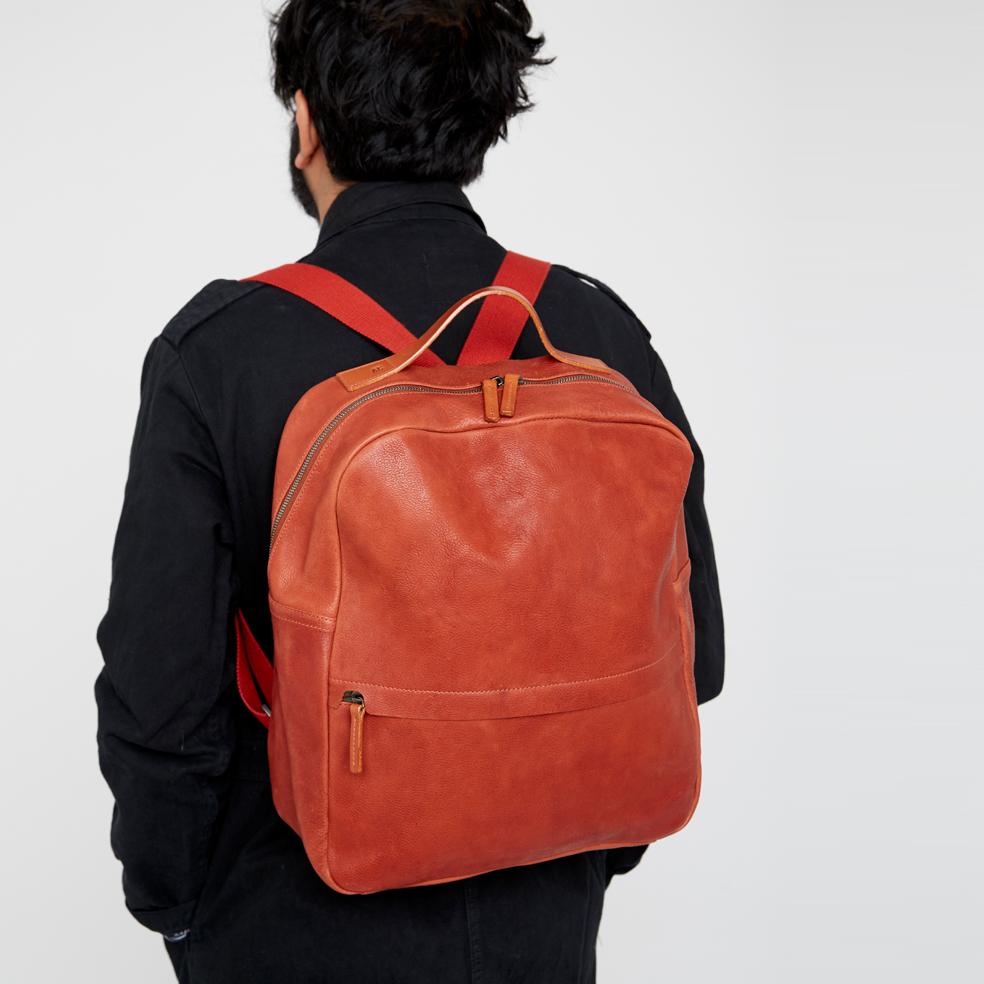 Dark green leather on sale backpack