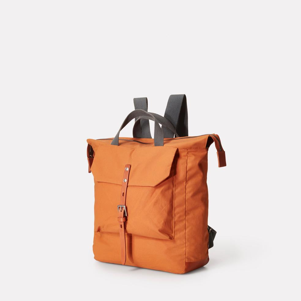 Frances Waxed Cotton Rucksack in Orange Backpacks Ally Capellino