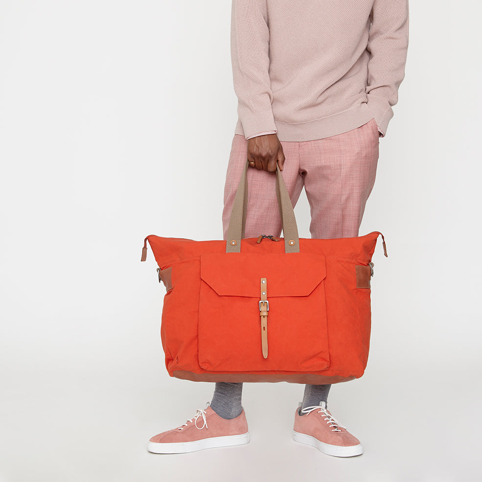 Freddie Waxed Cotton Holdall in Flame Orange