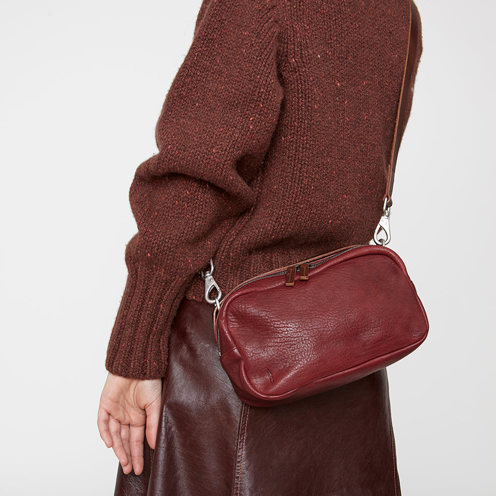 Plum cross body hot sale bag