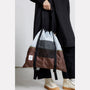 Harvey Packable Drawstring Tote Backpack in Brown model image