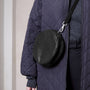 Bill Circle Calvert Leather Crossbody Bag in Black on Model