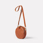 Ally Capellino Calvert Leather Bill Crossbody Bag side view in Redwood