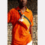 Herbert Packable Zip Top Belt Bag in Orange model image
