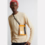 Herve Packable Pouch in Orange folded pouch model image