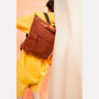 Hoy Mini Leather Backpack in Red Wood model detail