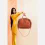 model detail Jago Bowler Calvert Leather Bag in Red Wood